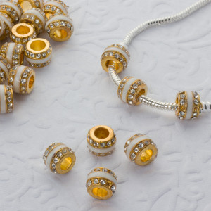 Koralik w złotym kolorze emaliowany z kryształkami crystal 5mm