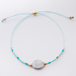 Bransoletka ze sztuczną perłą na sznureczku z koralikami Miyuki turkusowa